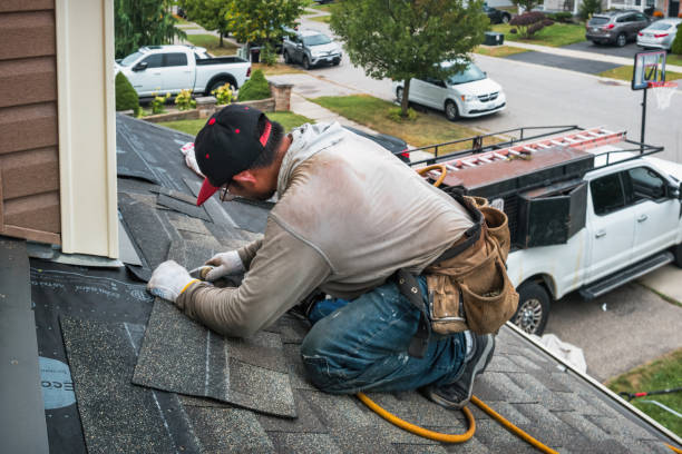 Professional Roofing technician working in Minetto, NY